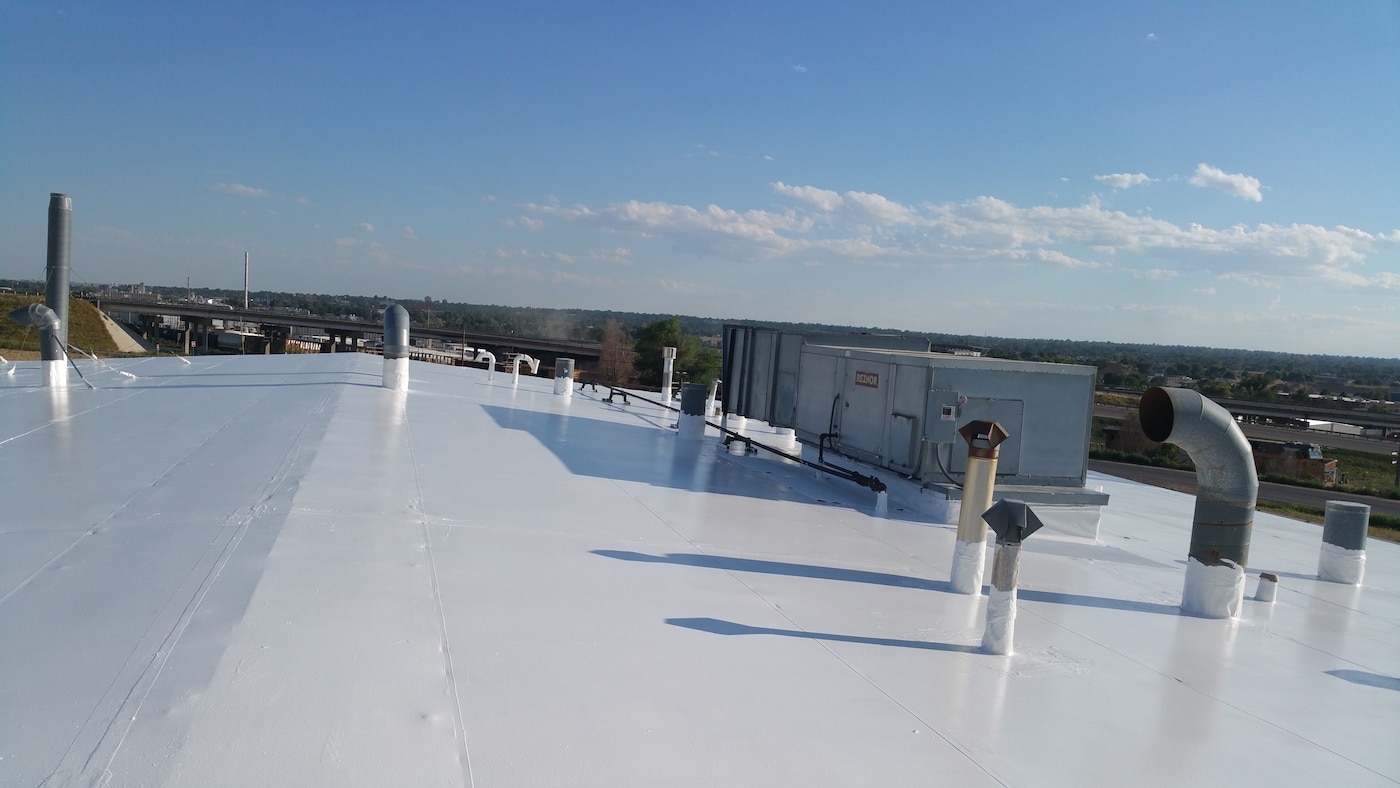 Commercial Roof Gets New Coating of Inland Coating RC2000. Greeley, CO