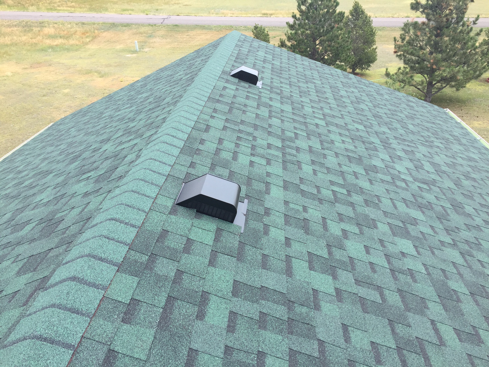 Cheyenne New House Roof with Duration Chateau Green Shingles