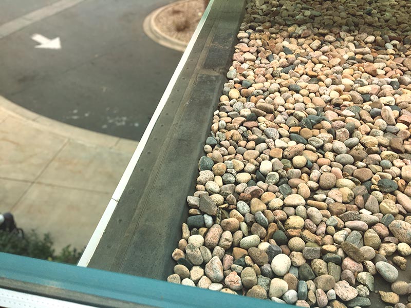 an epdm roof ballasted with rocks