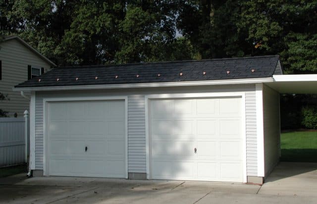 snow guard installed onto residential garage